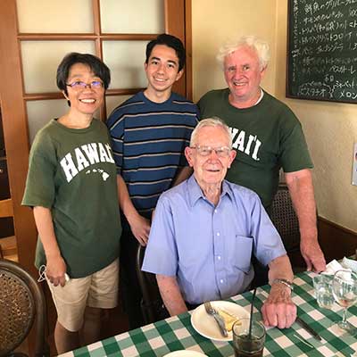 An SVD missionary serving as a feet-on-the-ground missionary while sharing an intercultural meal with friends and students
