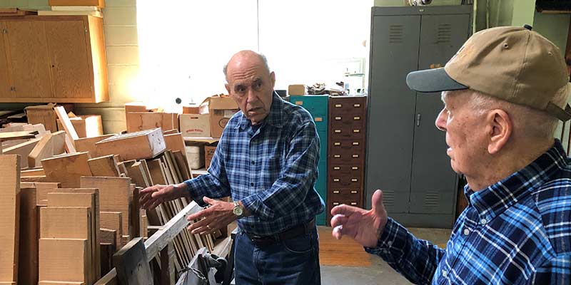 Society of the Divine Word donor, Victor Krueger, with SVD Father Bill Halvey in the wood shop at Techny.