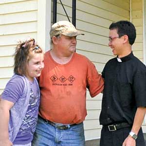 Father_Thien_at_Foot_Pantry_with_residents.jpg