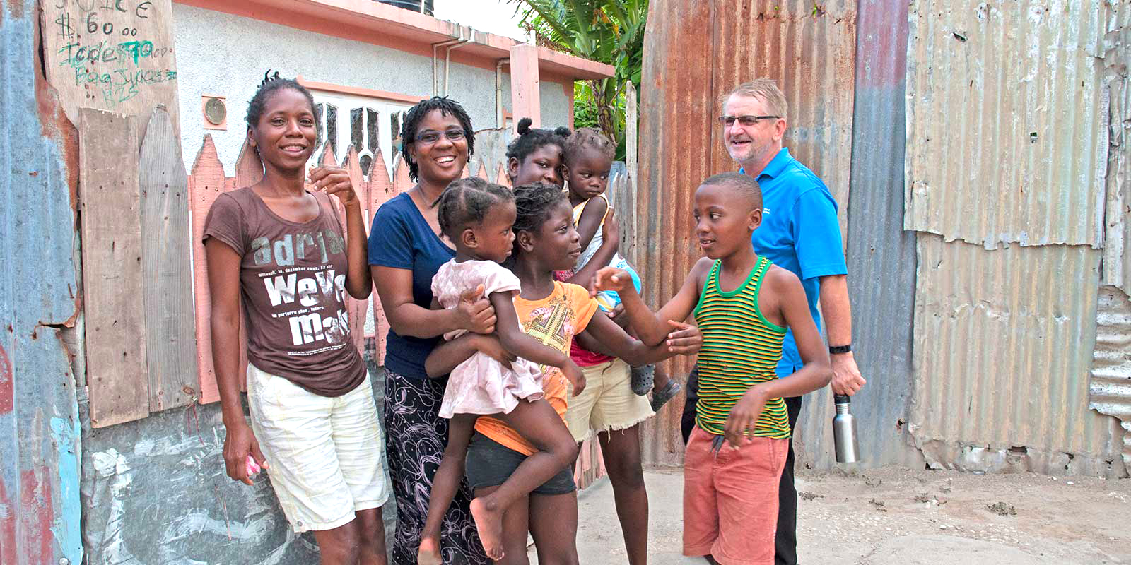 Father Bernard in Jamaica with community members