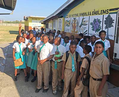 Children waiting for breakfast at Port Henderson School in Jamaica.
