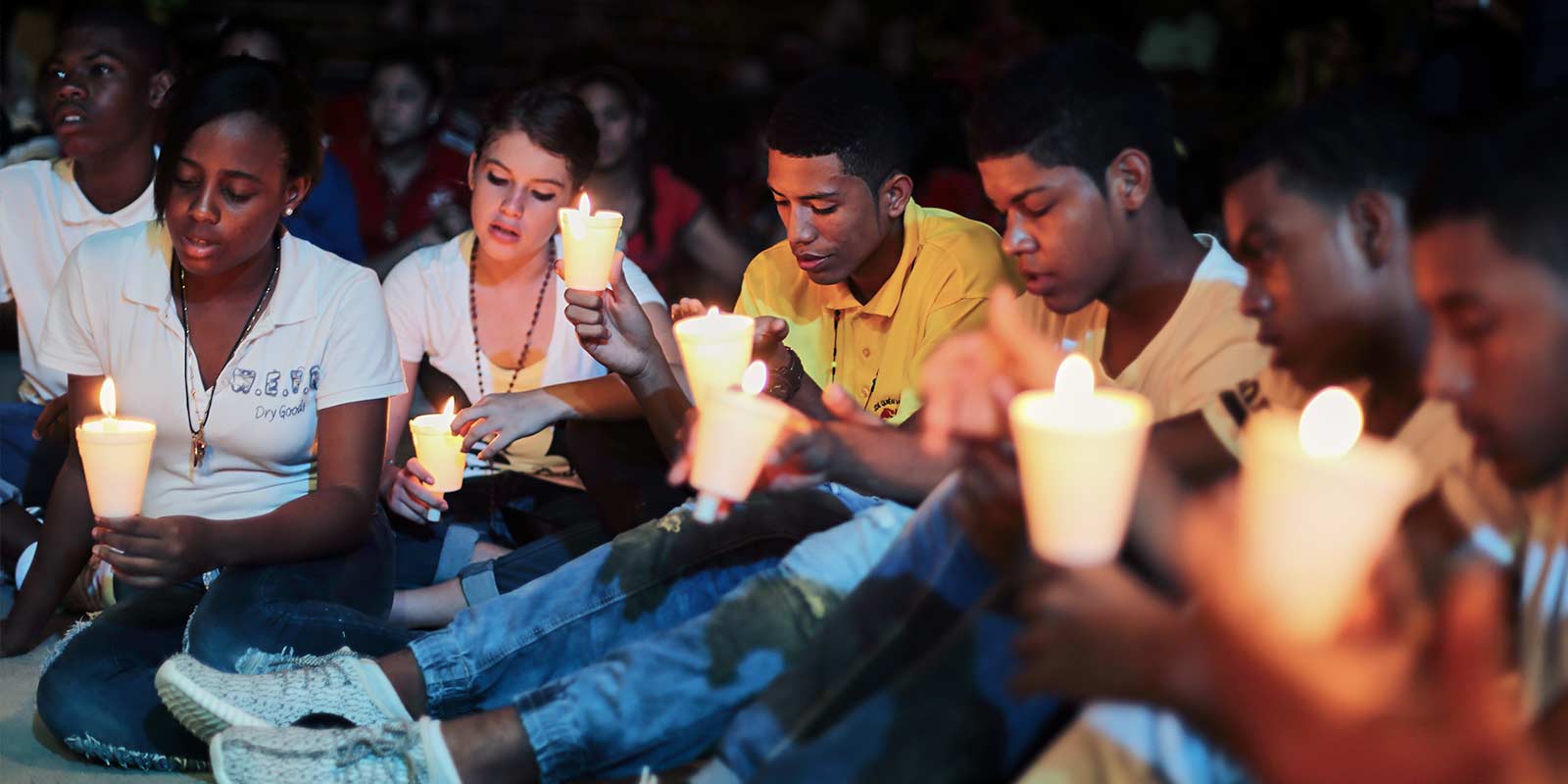 Young adults with candles